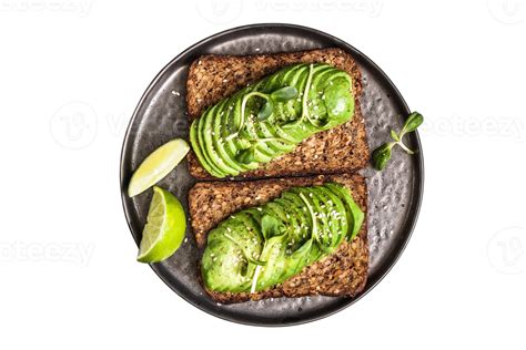 Black plate with toast and avocado slices isolated on a transparent background 21949828 PNG