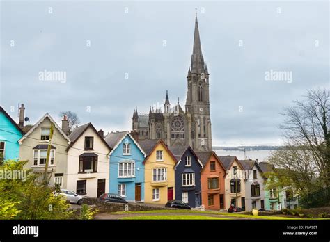 Cathedral and colored houses in Cobh, Ireland Stock Photo - Alamy