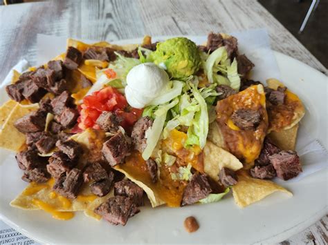 Calories in this entire plate of nachos? I ate them all : r/caloriecount