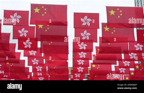 Flags of the People's Republic of China and the Hong Kong SAR are seen ...