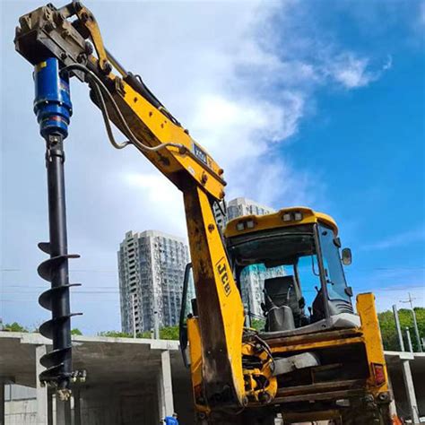 What is a hydraulic auger and how does it work - RAY Attachments