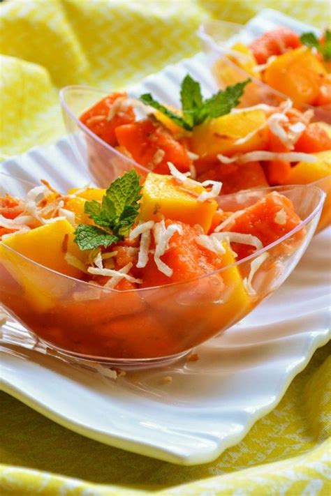 two small bowls filled with food on top of a white plate