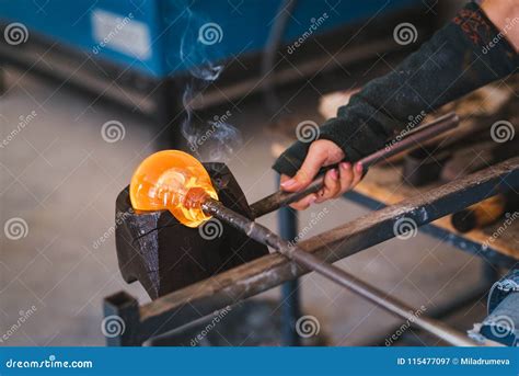 Glass making process. stock image. Image of blowing - 115477097