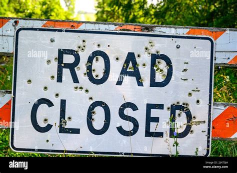 Buckshot road closed sign in front of a washed out bridge Stock Photo - Alamy