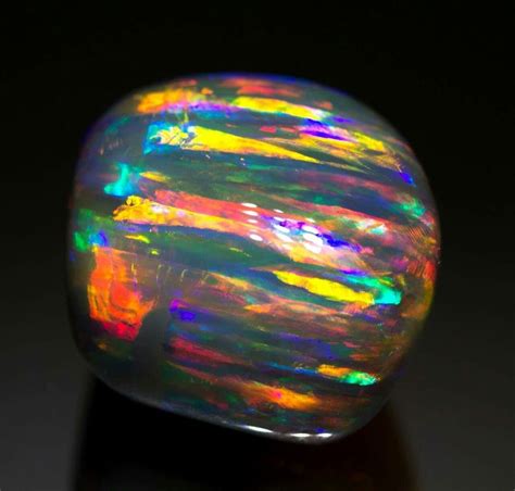 The Rainbow Serpent Opal from Lightning Ridge, NSW, Australia Photo: black opal direct Amazing ...
