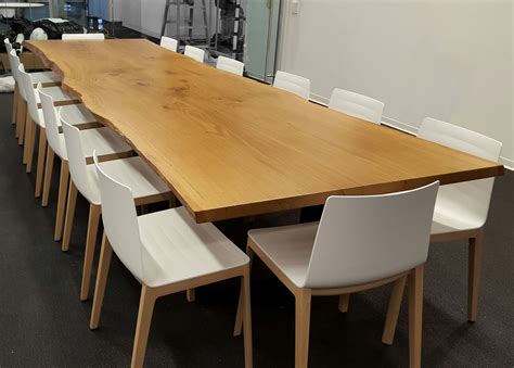 This beautiful conference table by RSTco. features North American White Oak bookmatched slabs ...