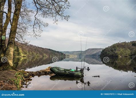 Fishing boat on the lake stock photo. Image of water - 190037072