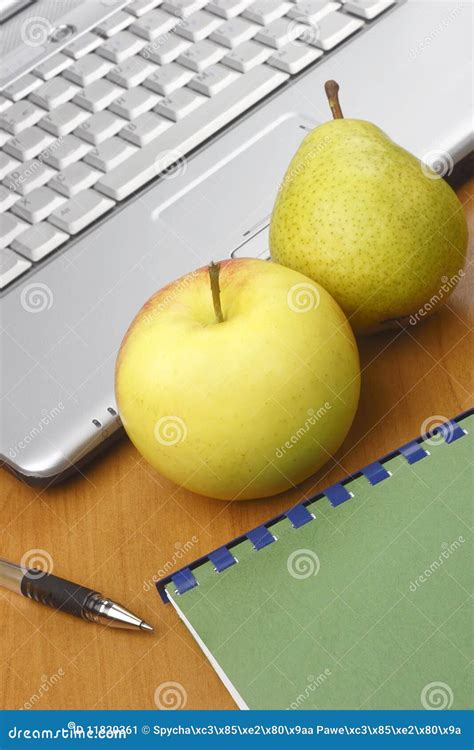 Apple,pear,pen and laptop stock image. Image of organic - 11820361