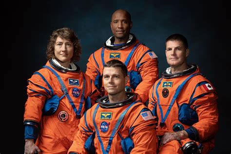 NASA unveils Artemis II crew including first woman, person of color to ...