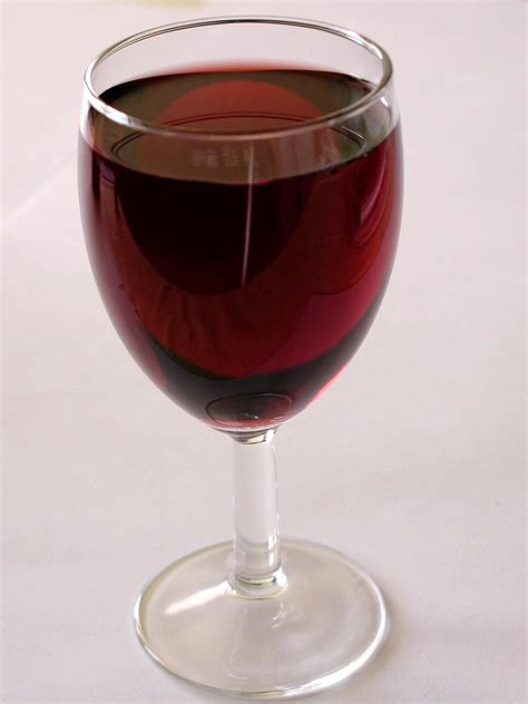 File:Red wine in glass.jpg