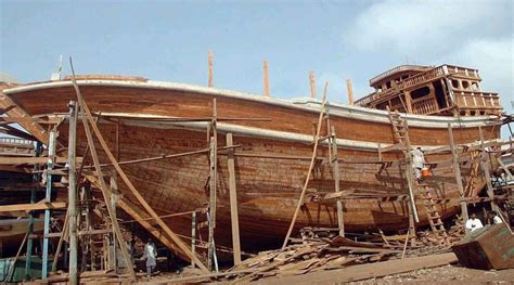 Iran, the Persian Gulf sea dhow men of art | Wooden boat building, New york city images, Wooden ...