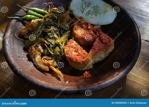 Tempe Penyet in a Traditional Stone Mortar Stock Photo - Image of bean ...