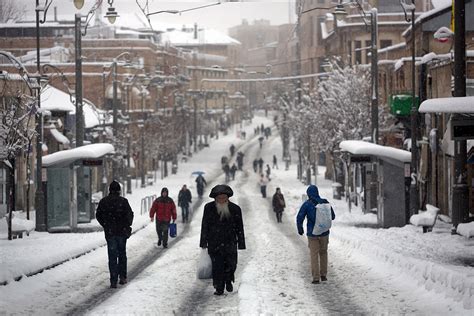 Jerusalem weather: Picture-postcard pretty photos of the Holy Land's ancient sites in the snow