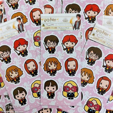 some harry potter stickers are on pink paper with white and red hair ...