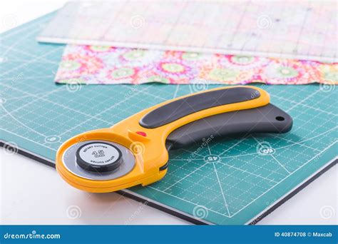 Rotary Cutter on a Green Mat Stock Photo - Image of quilting, equipment: 40874708