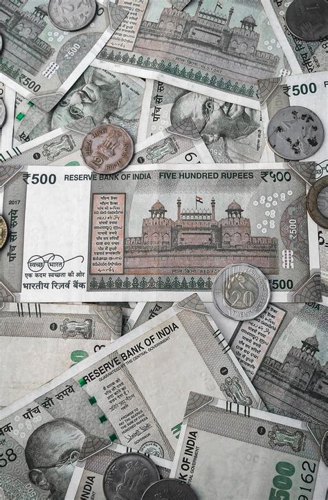 Download Indian Currency Banknotes And Coins Wallpaper | Wallpapers.com