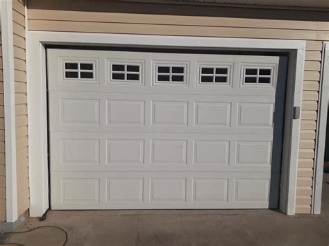 C.H.I. Garage Door Installation with Stockton Window Inserts in Pensacola, FL