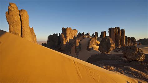 Rock formations and dunes at Tin Akachaker desert (Citadel), Hoggar ...