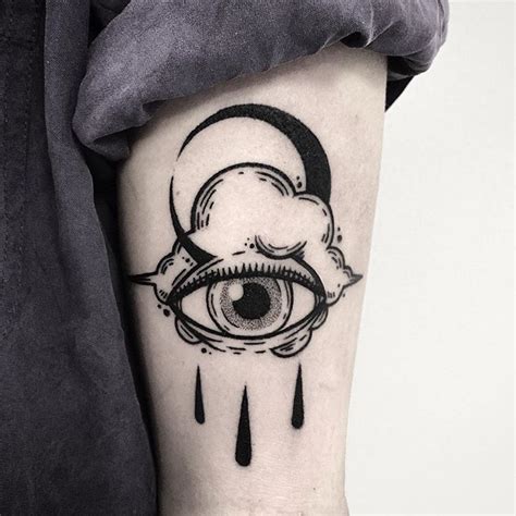 Crying eye cloud and crescent moon tattoo - Tattoogrid.net