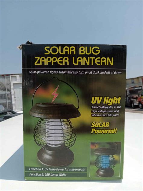 Solar powered bug zapper lantern - Silent Auction Biz