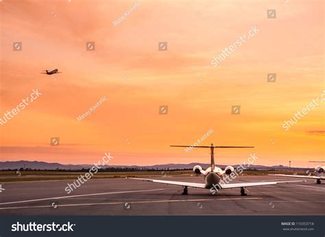 Airplane Taking Off At Sunset. Stock Photo 110353718 : Shutterstock