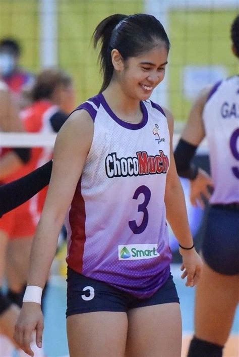 Female Volleyball Players Smiling on the Court