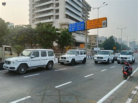 This is not a rally of Mercedes G-Class SUVs but the motorcade of security vehicles protecting ...