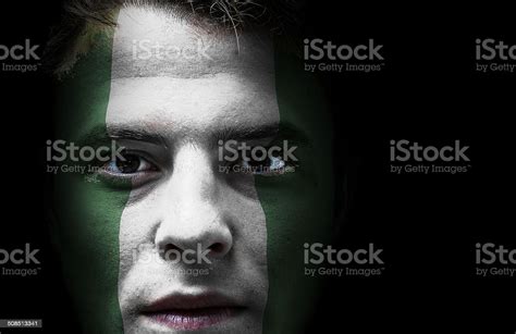 Nigeria Flag On Face Stock Photo - Download Image Now - Nigerian Flag, Human Face, Concepts - iStock