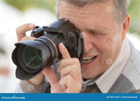 Senior Man with a DSLR Camera Stock Image - Image of digital, male ...