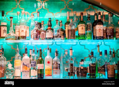 Bar Wall Display of Liquor Bottles Stock Photo - Alamy