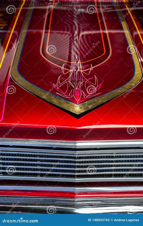 Detail of the Hood of a Red and Chrome Car with Hand-painted Lines Stock Image - Image of ...