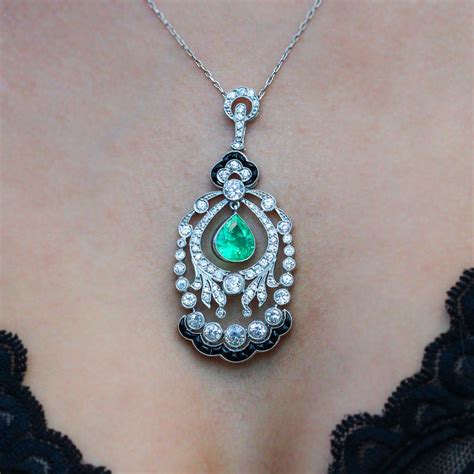 This beautiful Art Deco inspired pendant is a #LineageByLevys design centering attention around ...