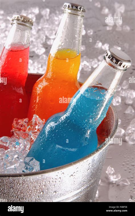 Bottles of cool drinks in ice bucket Stock Photo - Alamy