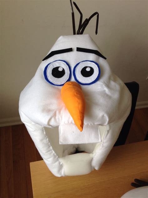 How to make olaf head, using felt I made eyes and eyebrows, I covered a foam shaped nose with ...