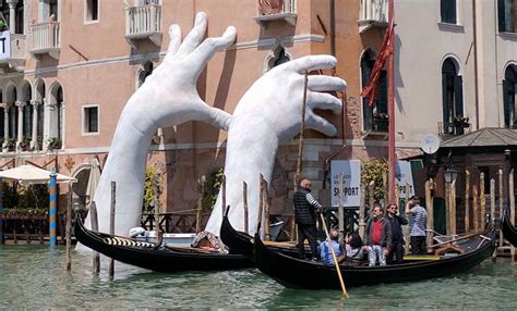 Lorenzo Quinn Comments On Climate Change With Giant Hands In Venice