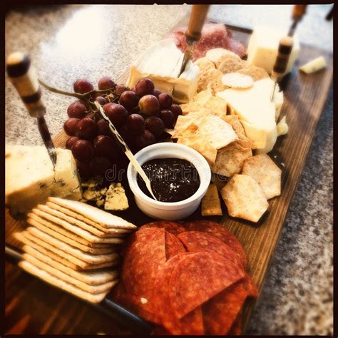 Cheese board stock image. Image of crackers, brie, natural - 194213399