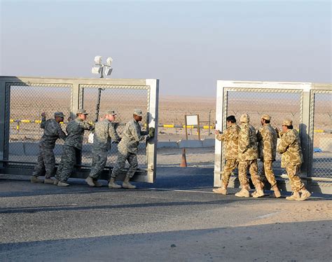 Military Photos Gate Closes After Last Convoy Passes