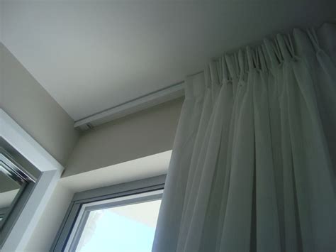 Furniture: Superb Automated Curtain Track System Also Hidden Curtain ...