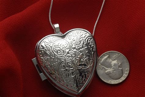 Heart Shaped Music Box Necklace with sterling by VanityJewelBox