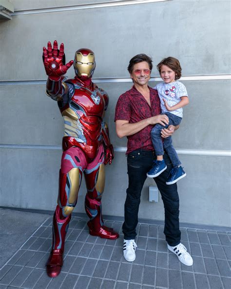 John Stamos and Wife Caitlin Take Son Billy to Disney Theme Park