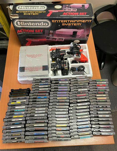 NINTENDO NES CONSOLE ACTION SET USED IN ORIGINAL BOX WITH -99- GAMES