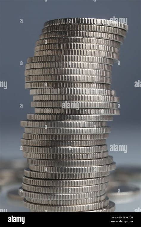 Stacks of money coins Stock Photo - Alamy