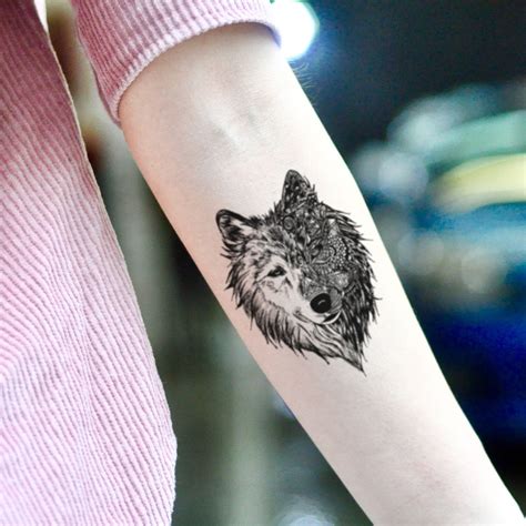 Alpha Wolf Symbol Tattoo