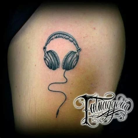 Headphone tattoo | Music tattoo designs, Headphones tattoo, Music notes tattoo