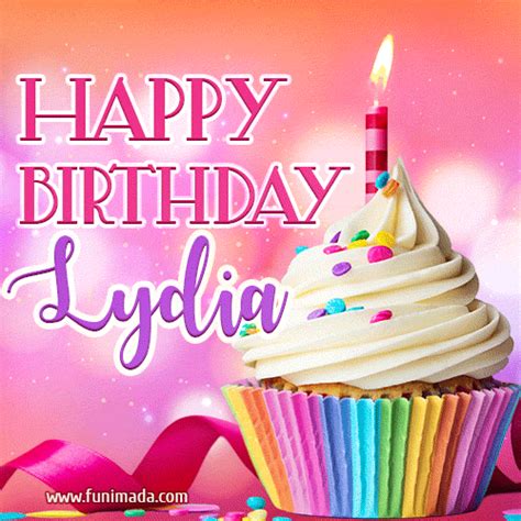 A GIF featuring the name Lydia, a decorated cupcake with a lit candle ...