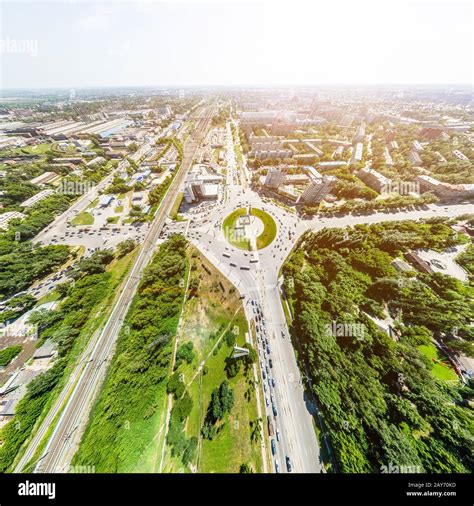 Aerial city view with roads, houses and buildings Stock Photo - Alamy