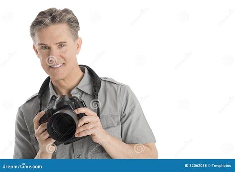 Confident Male Photographer With Camera And Umbrella Lights Stock Photo - Image: 32062038