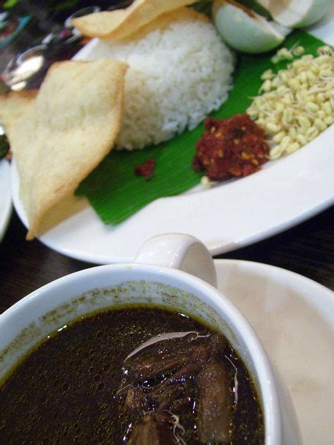 This authentic Nasi Rawon recipe is from Surabaya, Indonesia. It is served as a main course or ...