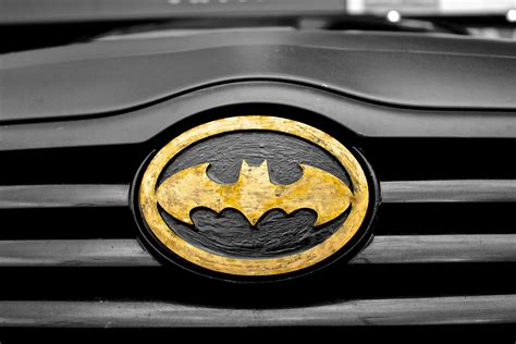 Black and Brown Batman Emblem Close-up Photography · Free Stock Photo