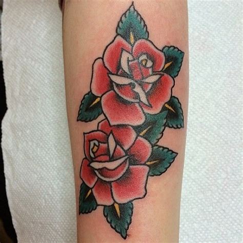 Double, traditional-style rose tattoo | Traditional rose tattoos, Rose ...